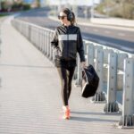 Sports woman walking after the training outdoors