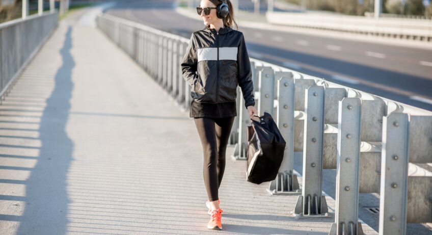 Sports woman walking after the training outdoors